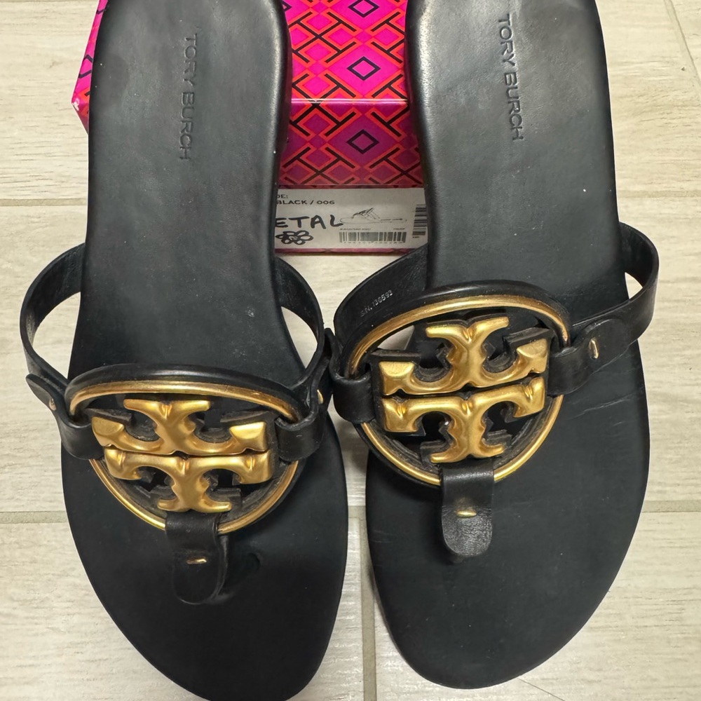 Tory Burch Black and Gold Sandals with Iconic Medallion